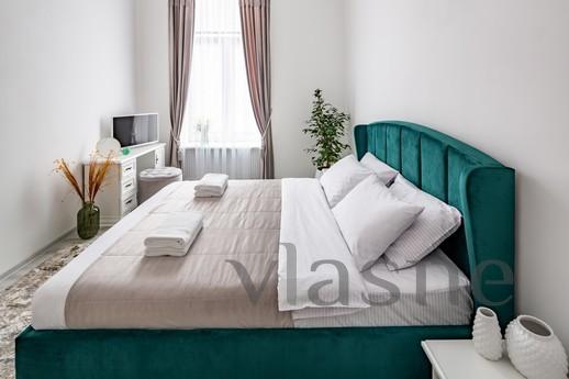 The apartment is located in the historic city center at 25 S