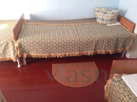 There are 4 bedrooms, separate kitchen from the owners, a su