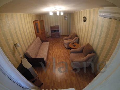 A passageway and two separate rooms, an open loggia. T / V a