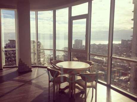 ARCADIA. Apartment with a bedroom and a kitchen-studio. With