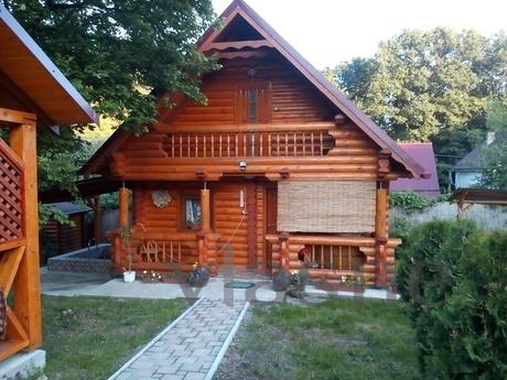 House loft-style of a log house. There is a sauna, swimming 