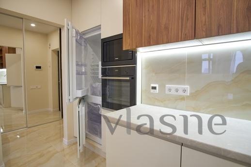 Species 2-room Deluxe new building, circ, Kyiv - apartment by the day