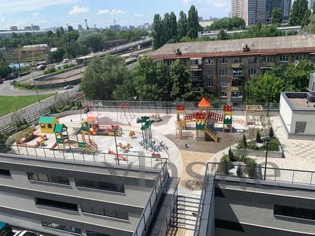 Species 2-room Deluxe new building, circ, Kyiv - apartment by the day