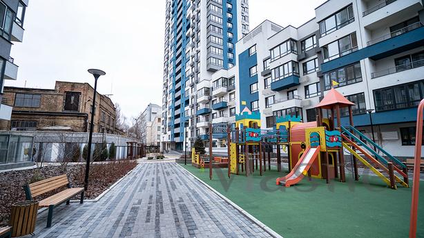 Лофт студио с камином,  новострой, м.КПИ, Киев - квартира посуточно