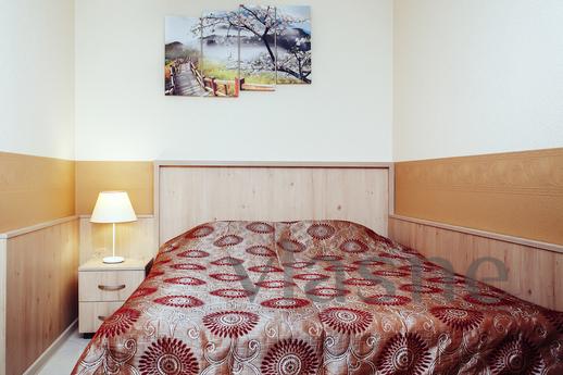 The apartment is located in the heart of the city, near the 