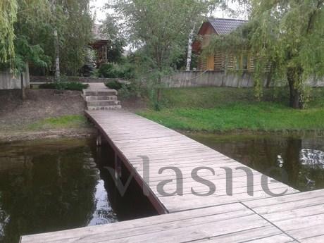 Loghouse and bathhouse by the river, Krivoy Rog - apartment by the day