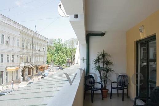 New building at the corner of Deribasovs, Odessa - apartment by the day