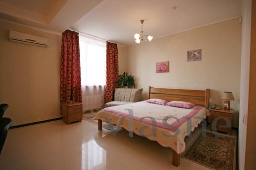 The soft colors for a hotel-type apartments in the heart of 