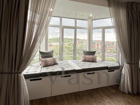 Zatishna 2-room apartment in the center of Podil, with a pan