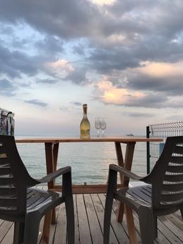 Rent a 3-level apartment in a house on the sand. The house i