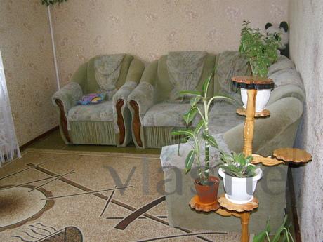 I rent a 2-bedroom apartment in the center of Saki near the 