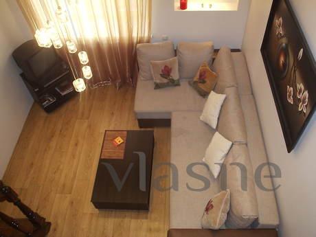 A two-level apartment with two nodes san on the second floor