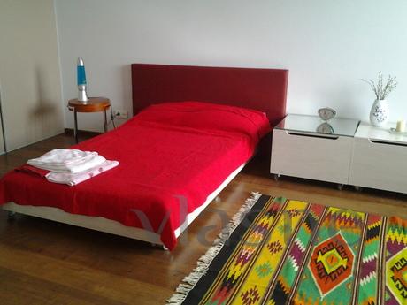 Studio apartment with a panoramic view of the city and the s