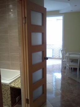 Rent an apartment in a new building on T, Odessa - apartment by the day