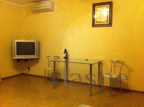 Cozy studio apartment with a kitchen studio. Convenient tran