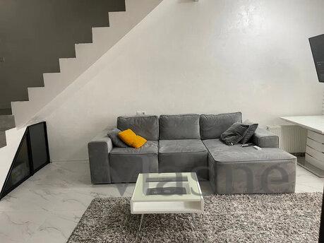 A unique 2-storey luxury studio in a modern 15-storey reside