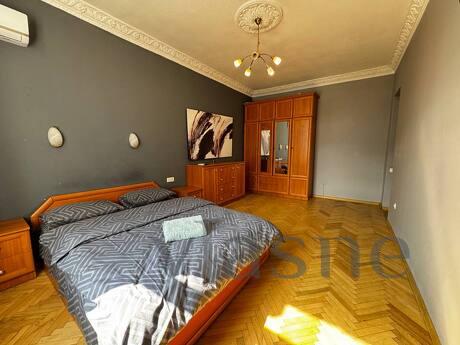 Rent a 3k apartment near the center of the capital The spacious and bright apartment, designed in modern style,