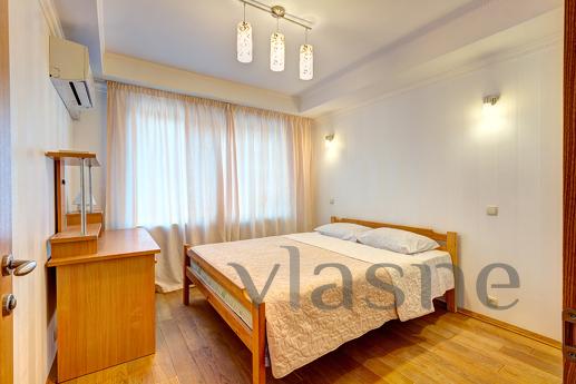 The apartment has three rooms (2 bedrooms and a living room 